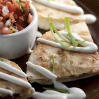 Quesadillas · Choice of meat stuffed between flour tortillas with scallions, cilantro, chopped tomatoes, M...