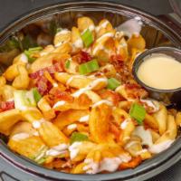 The Best Fries Ever · Our signature fries, seasoned with old bay, drizzled with ranch, topped with chopped bacon a...