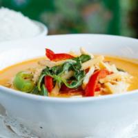 Thai Red Curry · Spicy. Red curry paste, bamboo, sweet basil and bell pepper in coconut milk.