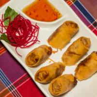 Spring Roll · 2 crispy springs rolls stuffed with chicken or pork and vegetable served with chili sweet an...