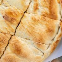 Veal Parmesan Calzone - Small · Homemade Veal with Sauce and Cheese baked in a Calzone
