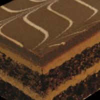 Cholate Truffle Square · Smooth chocolate mousse layered between chocolate cake and covered with chocolate ganache.