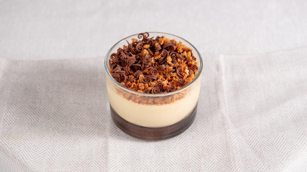 Coppa Mascarpone
 · A chocolate cream followed by a smooth mascarpone cream, topped with Amaretti cookie crumbs and chocolate curls.