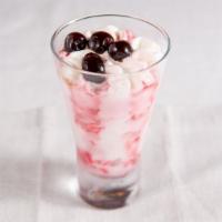 Coppa Spagnola
 · Vanilla and cherry gelato swirled together topped with cherries.