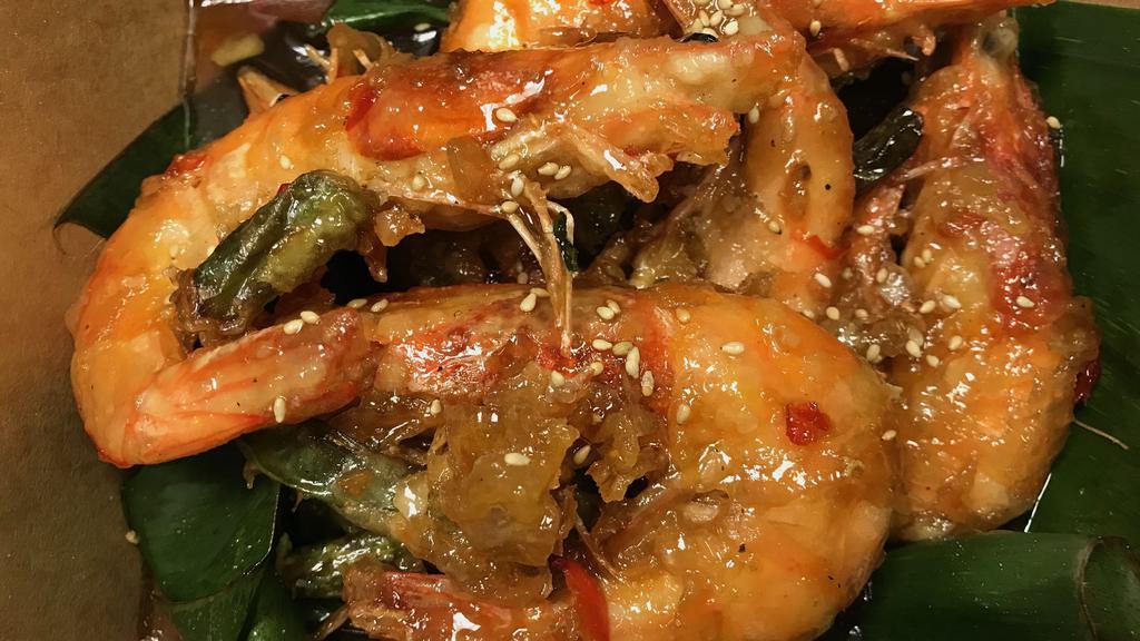 Crispy Shrimp · Five large fried whole shrimp and crispy green beans. Tossed in a tangy sweet dark soy sauce. Served with rice