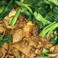 Pad See Ew Pork · Wide rice noodles with garlic, Chinese broccoli, and egg