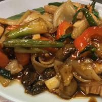 Drunken Noodles Beef · Wide rice noodles with Thai chilies, onions, mushrooms, and basil. Spicy