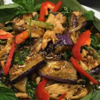 Eggplant Basil W/ Tofu · Sichuan eggplant with garlic, peppers & Thai basil. Spicy