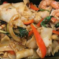 Drunken Noodles Seafood · Shrimp and Scallops. Wide rice noodles with Thai chilies, onions, mushrooms, and basil. Spicy