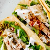 Mahi Mahi · Mexican style street tacos (3), salsa, lettuce, radish, carrots, and chipotle mayo.