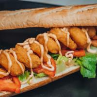 Shrimp Poboy Sandwich · Battered and fried shrimp, lettuce, tomatoes and old bay aioli.
