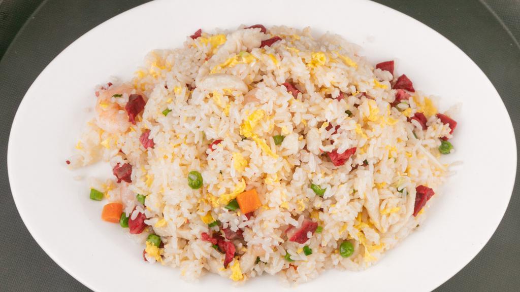 Yango Chow Fried  Rice · Shrimp, roast pork, chicken, eggs, and vegetables.