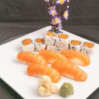 Salmon Boy · Spicy. Six pieces spicy salmon maki and five pieces salmon nigiri. Served with miso soup.