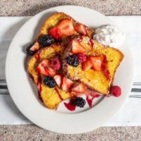 Mixed Berry Waffle  · Strawberries and blueberries with Melba sauce and whipped cream