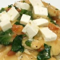Chicken Athena · Sauteed chicken breast topped with tomatoes and spinach in a white wine garlic sauce and fet...