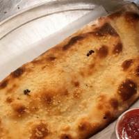 Calzones · One size calzone with mozzarella and ricotta. You may choose additional fillings. Red sauce ...