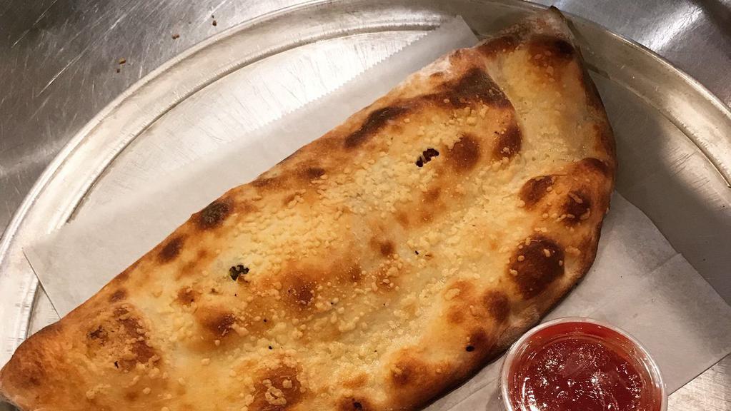 Calzones · One size calzone with mozzarella and ricotta. You may choose additional fillings. Red sauce comes on the side.