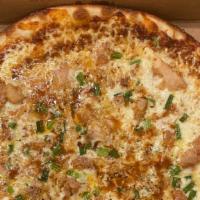 Bbq Chicken · Smoked chicken, BBQ sauce, smoked Gouda, mozzarella, scallions. This pizza does not have red...