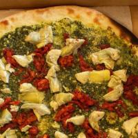 Veggie Pesto · Pesto, artichokes, sun-dried tomatoes, fresh garlic. This pizza does not have red sauce or m...
