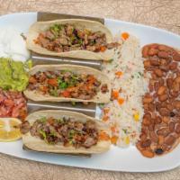 Tacos Al Carbon · Soft shell tacos with charbroiled steak or chicken. Served with guacamole, sourcream, pico d...