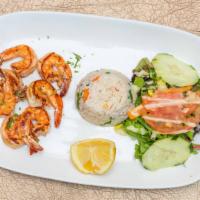 Camarones A La Plancha · Jumbo shrimp grilled to perfection. Served with rice and salad.