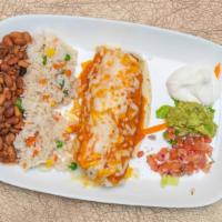 Vegetarian Burrito · One big flour tortilla roll covered with mozzarella cheese. Served with rice, guacamole, sou...