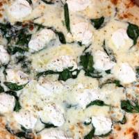 White Spinach Pizza · Spinach, garlic, ricotta, Mozzarella and Romano cheese.