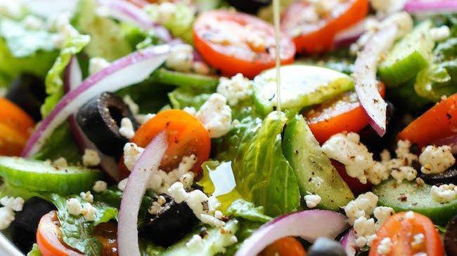 Greek Salad · Mixed greens, Feta cheese, tomatoes, cucumbers, olives, onions, carrots, sweet peppers, croutons. add choice of protein!