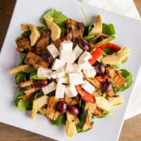 Mediterranean Salad · Spinach, eggplant, artichoke, roasted peppers, olives and Feta cheese.