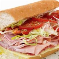 American Hoagie · Ham, turkey and American cheese on homemade panino bread with lettuce, tomatoes, onions and ...