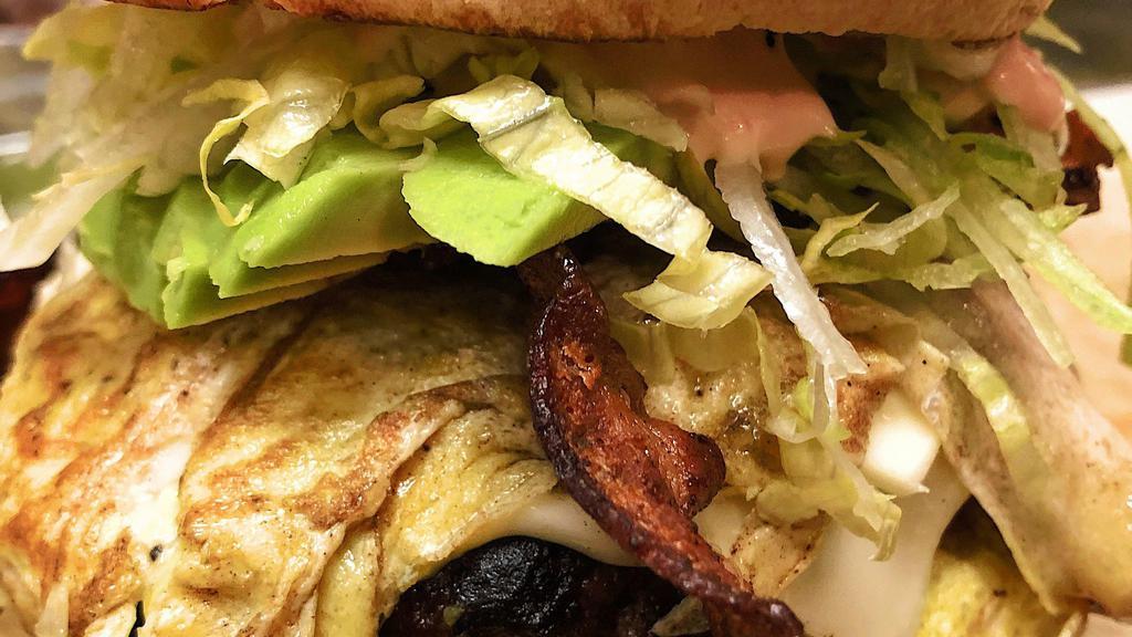 Breakfast Burger · Delicious burger wrapped in egg omlette!