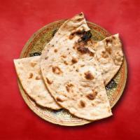 Tandoor Roti · Whole wheat flat bread baked to perfection in an Indian clay oven.