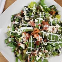 Ranchero Avocado Salad · Mixed lettuce with Cotija cheese, tomatoes, chopped avocado, black beans and ranch dressing ...
