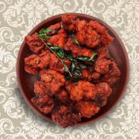 Divine Chicken Fritters · Tender boneless chicken marinated in a blend of fragrant spices,  coated in a chickpea flour...