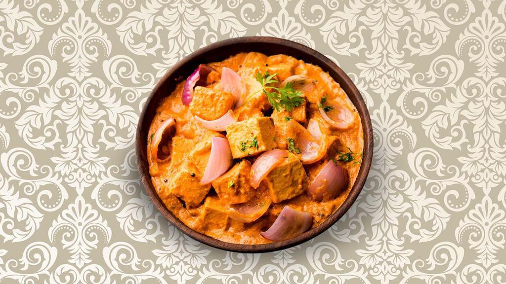 Scrumptious Cottage Cheese Tikka Masala · Diced cottage cheese cubes grilled and tossed in a mixture of Indian spices, garden herbs, and tangy tomato and onion masala sauce and finished with fenugreek leaves and cream. Served with a side of aromatic white rice.