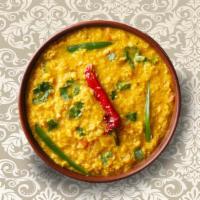 Yellow Lentils · Slow-cooked lentils, tempered with clarified butter, fried spices & herbs. Served with a sid...
