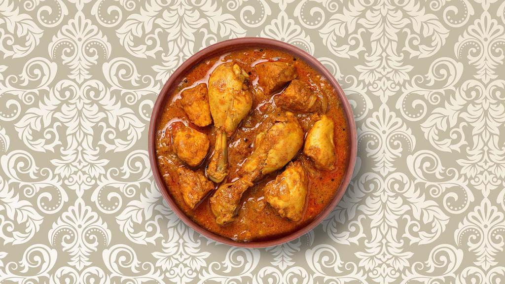 Clay Pot Chicken Curry  · Marinated chicken stewed in an onion- and tomato-based gravy, flavored with ginger, garlic, chili peppers, and a variety of spices. Served with a side of aromatic white rice.