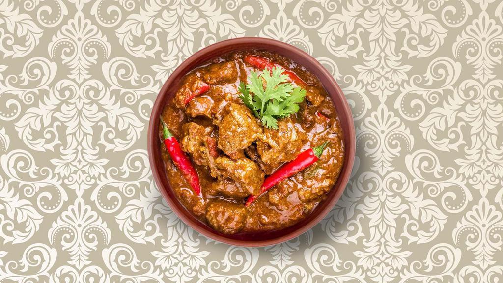 Clay Pot Lamb Curry  · Pieces of lamb stewed in an onion- and tomato-based gravy, flavored with ginger, garlic, chili peppers, and a variety of spices. Served with a side of aromatic white rice.