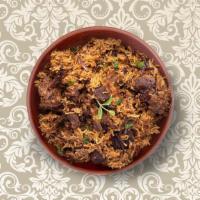 Clay Pot Lamb Biryani · Long-grained rice dish layered with spicy marinated lamb meat, caramelized onions and fresh ...