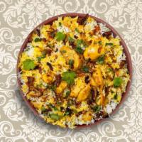 Clay Pot Chicken Biryani · Long-grained rice dish layered with spicy marinated chicken, caramelized onions and fresh he...