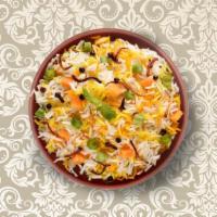 Clay Pot Veggie Biryani · Long-grained rice dish layered with garden-fresh vegetables and fresh herbs, homemade biryan...