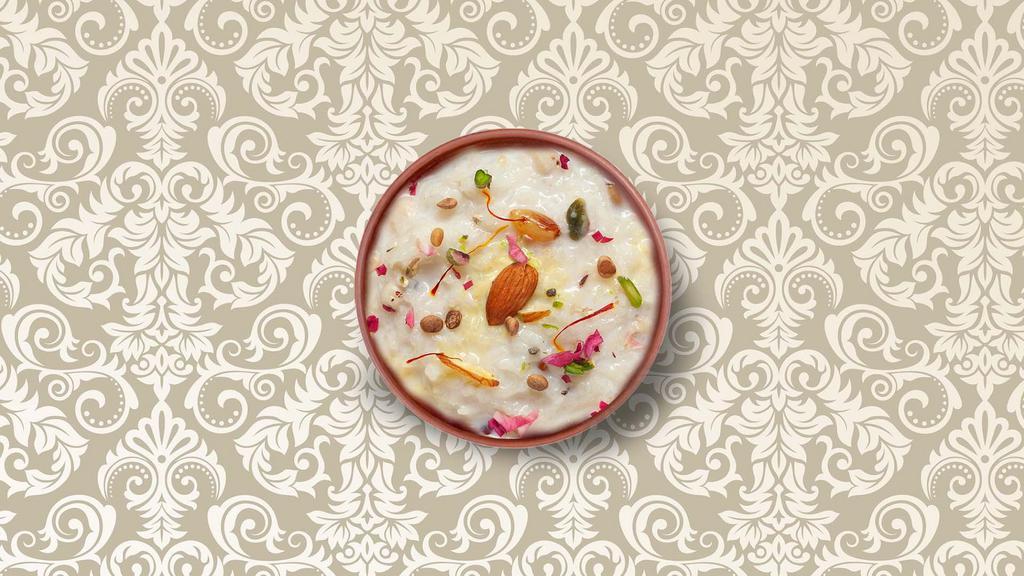 Rice Kheer · A type of wet pudding dessert made by rice, or bulgur wheat, or tapioca, or vermicelli, slow-cooked in boiling milk with sugar, or jaggery, and mildly flavored with cardamom, saffron, and garnished with chopped nuts.