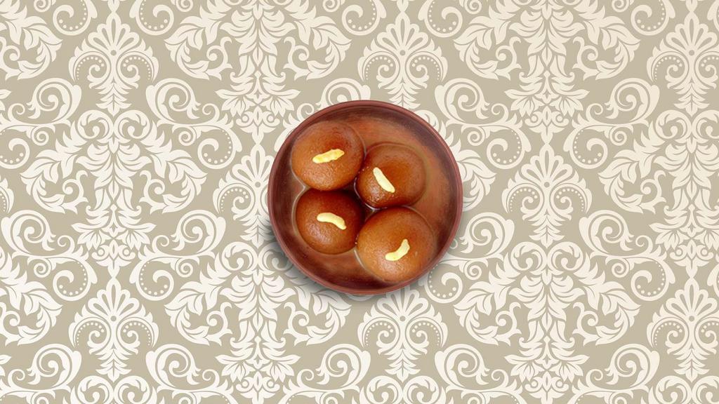 Gulab Jamun · Deep-fried soft dumplings made of dried milk, steeped in flavored sugar syrup.
