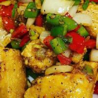 Salt & Pepper Tofu · Golden battered fried tofu cuts, tossed in aromatic salt and pepper seasoning with chopped g...