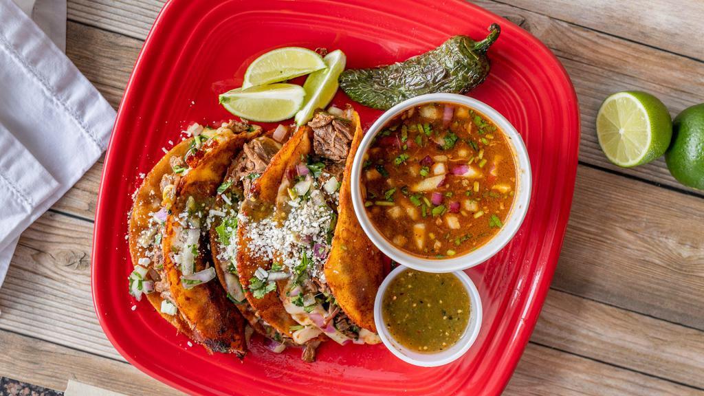 Quesobirria Tacos · 3 of Mexico's popular grilled beef birria tacos. Filled with cheese, birria, onions and cilanto. serve with birria consome. (Broth from the same birria for dipping