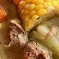Caldo De Res · A LARGE BOWL OF BEEF SOUP WITH VEGETABLES. SERVED WITH RICE, ONIONS, CILANTRO, FRESH LIME AN...