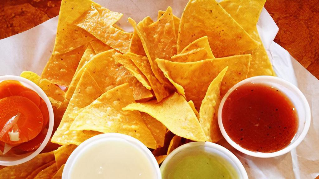 Chips & Salsa · 12 Oz. container of your choice of salsa. Restaurant style, avocado, green tomatillo, chipotle, Amiguitos  (verymild), or chile de Arbol ( very hot)