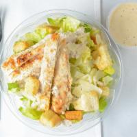 Caesar Salad · Romaine Lettuce, Parmesan Cheese, Garlic Croutons and Caesar Dressing.