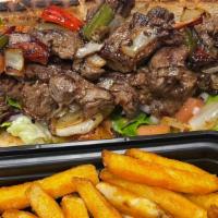Steak Tips Sub · Tender steak tips grilled with onion & peppers served on a 10