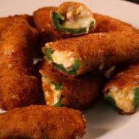 Mozzarella Stick · Cheese coated in a breaded crumb mixture and deep fried.